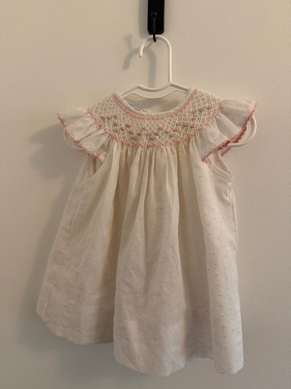 Ivory Smocked Ruffle-Sleeve Baby Blouse with Pink Detail